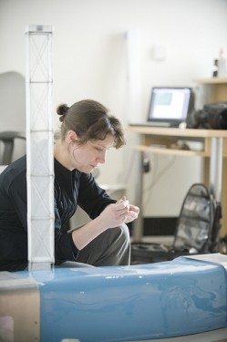 Sabrina Raaf installing A Light Green Light, 2010. Photo Erik Jepsen/UC San Diego. www.erikjepsenphotography.com/