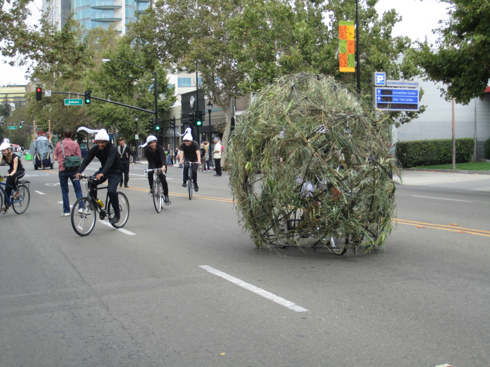 Sperm riders circle Egg during Green Prix parade