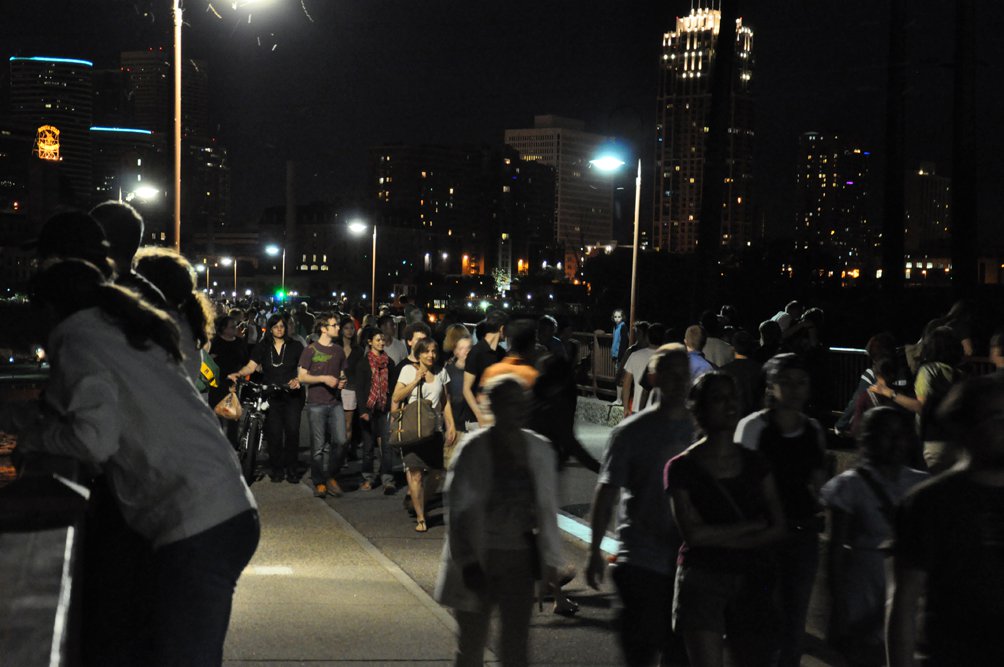 Flaneurs along the Stone Arch Bridge, Northern Spark, June 4, 2011. Photo Aaron Marx